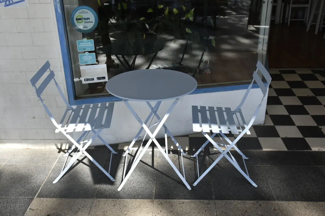 Bistro tables on the footpath